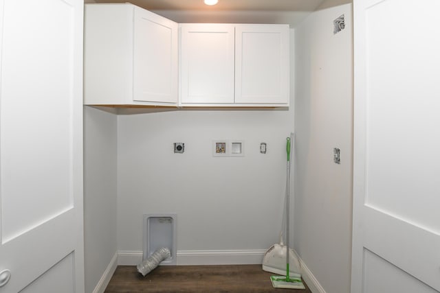 laundry area featuring dark wood-type flooring, cabinets, hookup for an electric dryer, and hookup for a washing machine