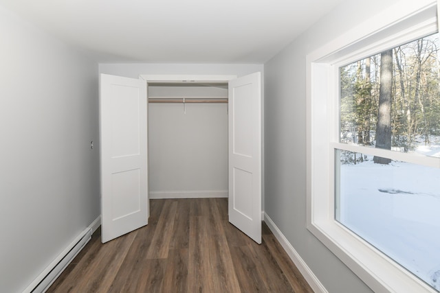 closet featuring a baseboard radiator