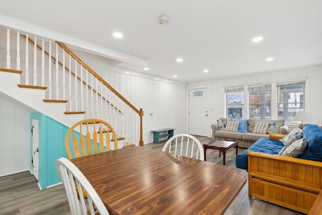 dining area featuring dark wood-type flooring