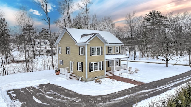 view of front of property featuring covered porch