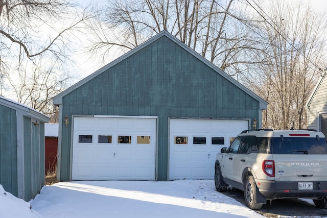 view of snow covered garage