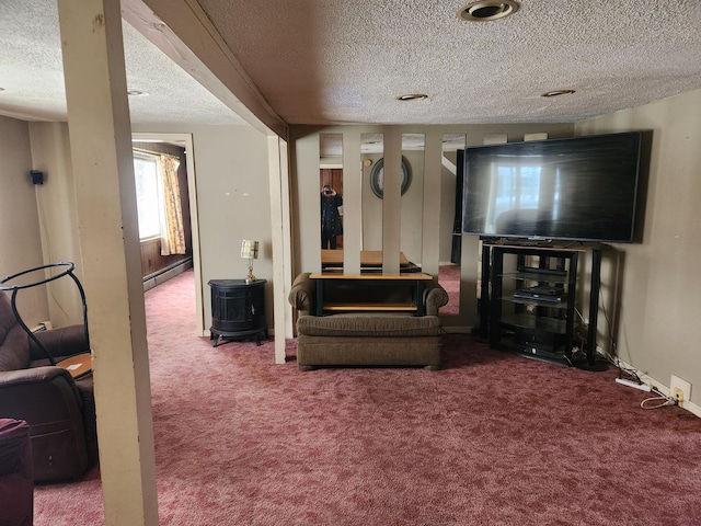 carpeted living room with a baseboard radiator and a textured ceiling