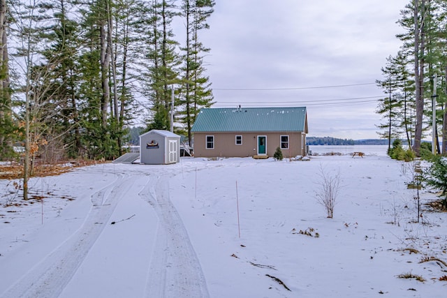 view of front facade with a shed