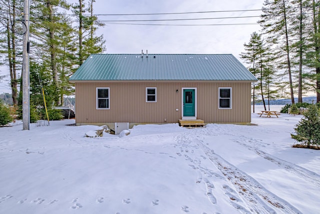 view of snow covered house