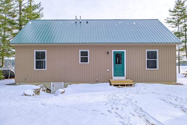 view of snow covered house