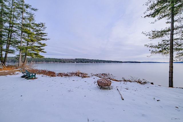 water view with a fire pit