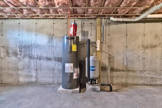 utility room featuring electric water heater