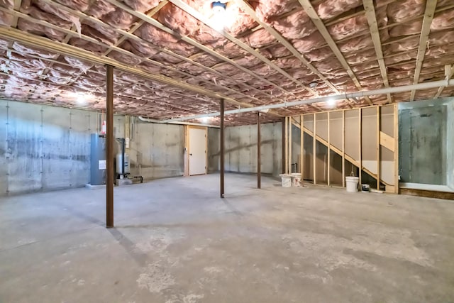 basement featuring water heater