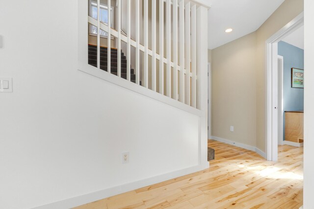 staircase featuring hardwood / wood-style flooring