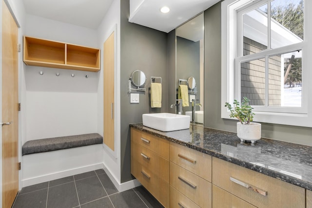 bathroom featuring tile patterned floors and vanity