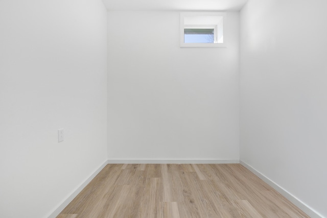 basement featuring light hardwood / wood-style floors