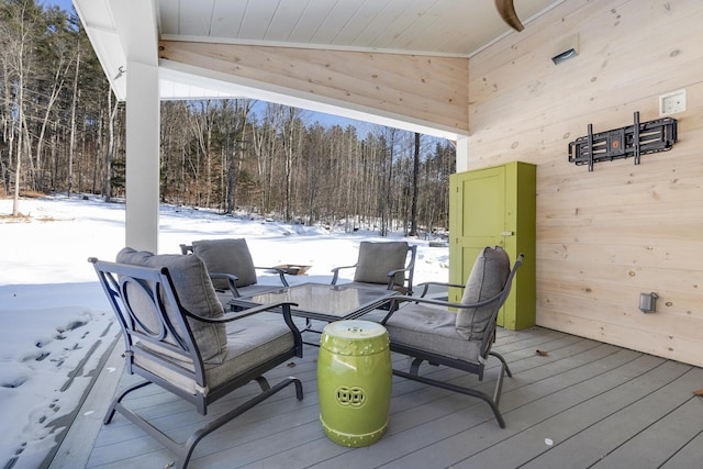 view of snow covered deck