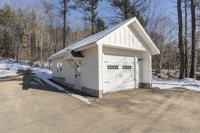 view of snow covered garage