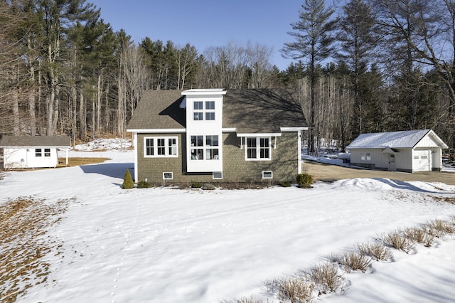 view of front facade with an outbuilding