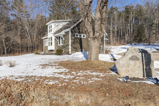 view of snow covered property