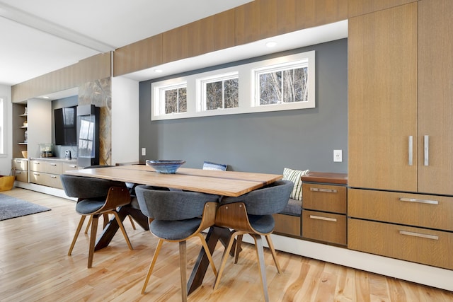 dining space with light wood-type flooring