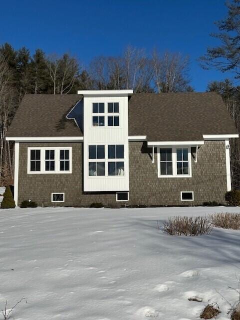 view of snow covered house