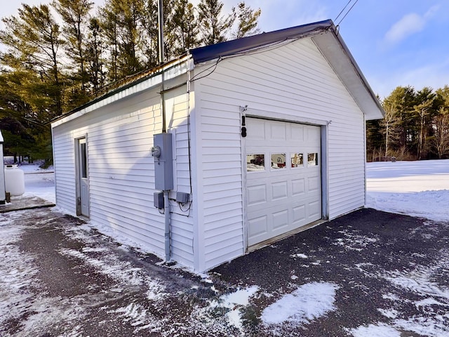 view of snow covered garage