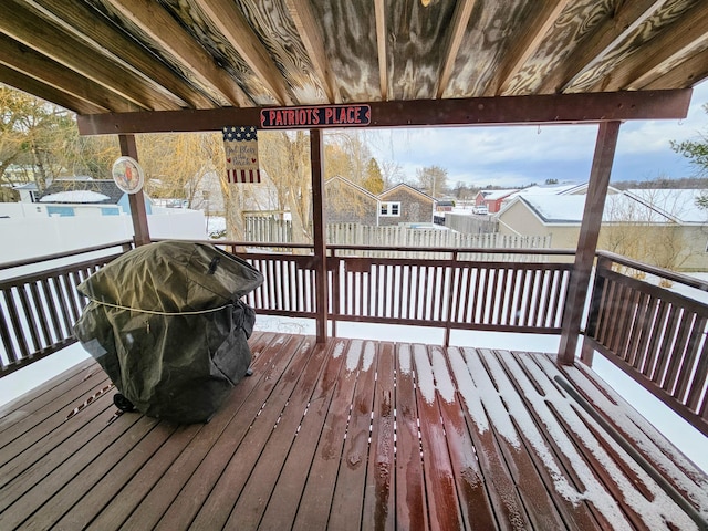 view of snow covered deck