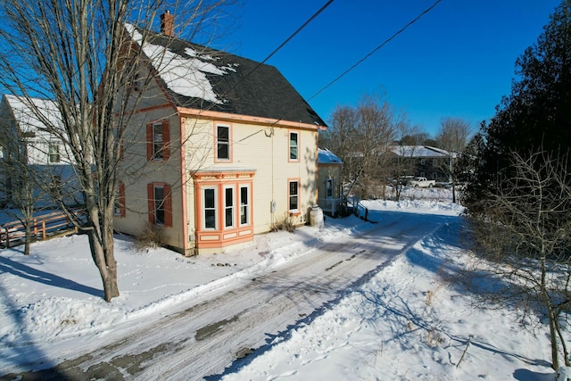 view of snow covered house