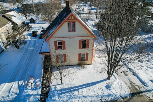 view of snow covered property