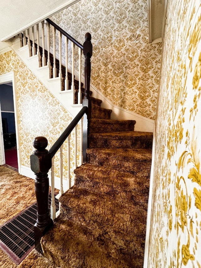 staircase with ornamental molding