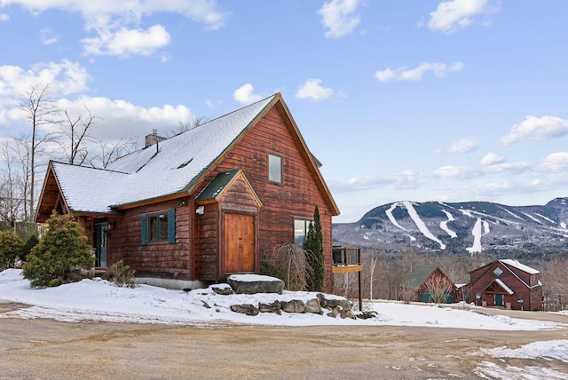 cabin featuring a mountain view