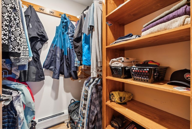 walk in closet featuring baseboard heating