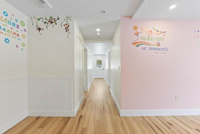 hallway featuring light hardwood / wood-style flooring