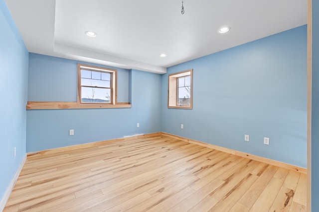 unfurnished room featuring light hardwood / wood-style floors