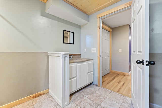 bathroom with vanity and tile patterned floors