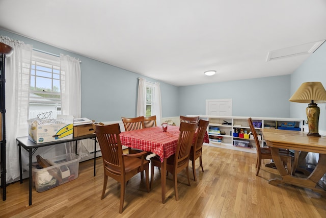 32 Beals Ave, Ellsworth, ME 04605 - dining area with light wood finished floors, healthy amount of natural light, and attic access