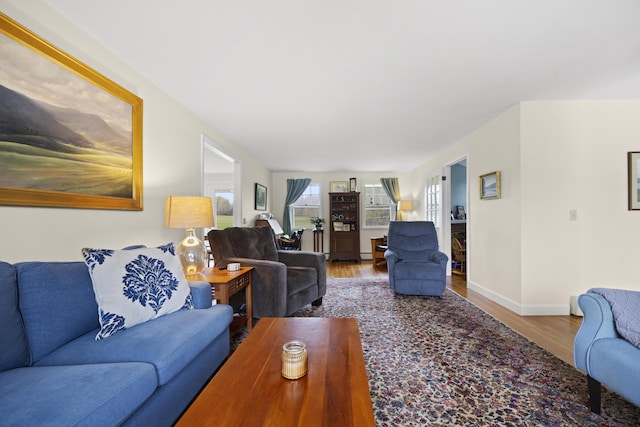 32 Beals Ave, Ellsworth, ME 04605 - living room featuring wood finished floors and baseboards