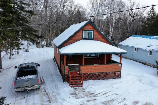 view of front of property featuring covered porch