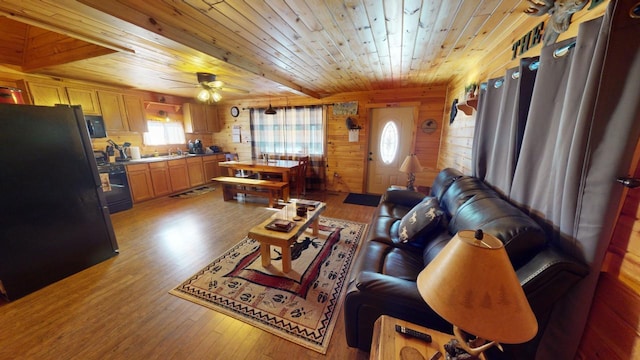 living room with wood ceiling, ceiling fan, light hardwood / wood-style flooring, and wood walls