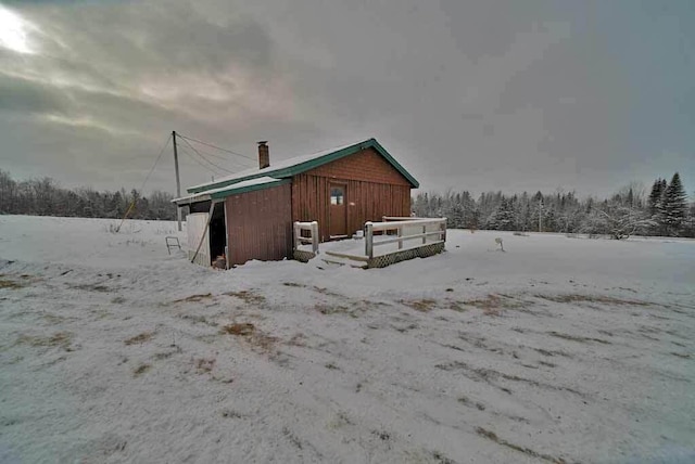 view of snow covered property