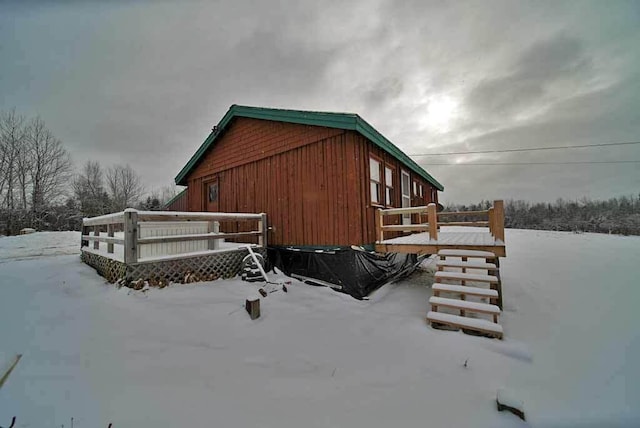 view of snow covered property