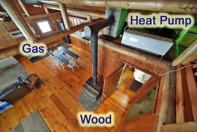 room details with wood-type flooring and a wood stove