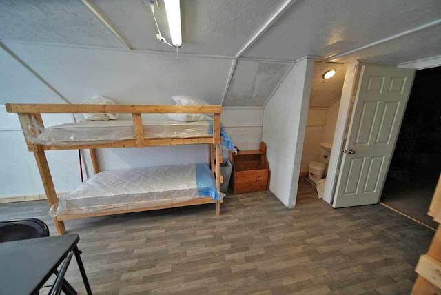 bedroom featuring dark hardwood / wood-style floors