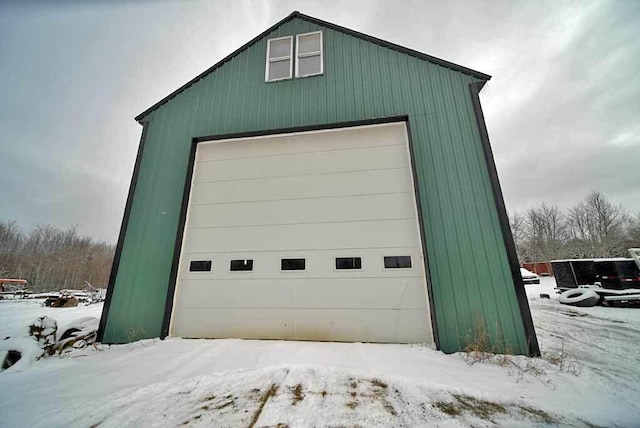 view of snow covered garage