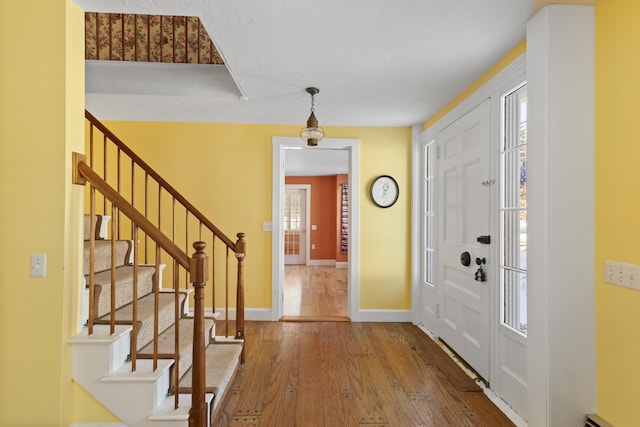 entryway featuring hardwood / wood-style flooring