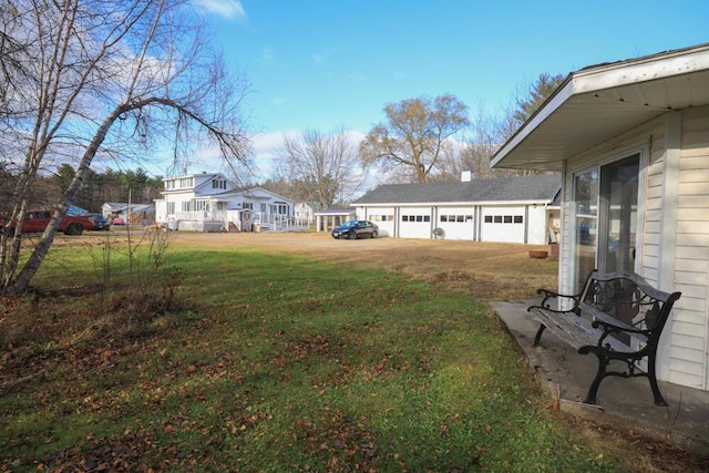 view of yard with a garage