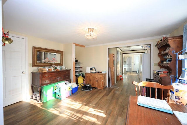 interior space featuring ornamental molding and wood finished floors