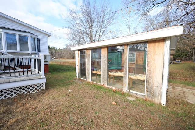 view of yard featuring a wooden deck