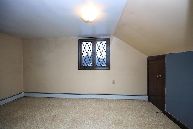 bonus room with vaulted ceiling, carpet floors, and a baseboard radiator