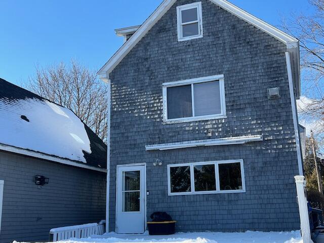 view of snow covered house