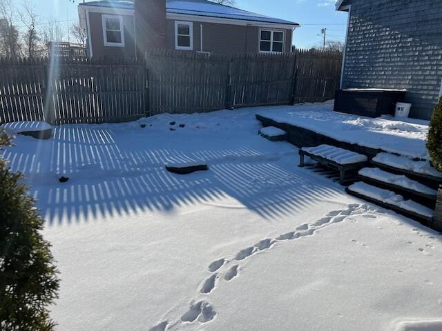 view of snow covered deck