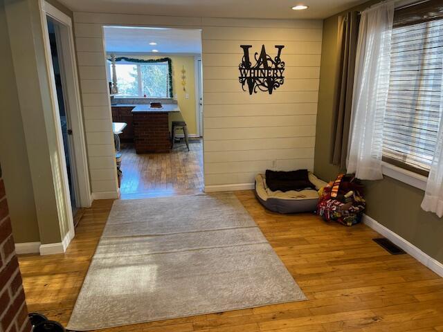 hallway featuring hardwood / wood-style flooring