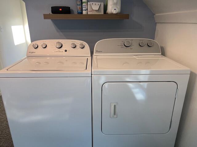 laundry room with washer and dryer