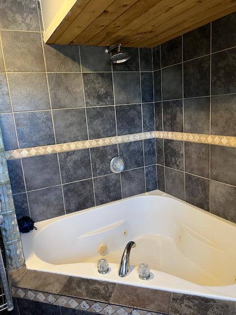 bathroom featuring wood ceiling